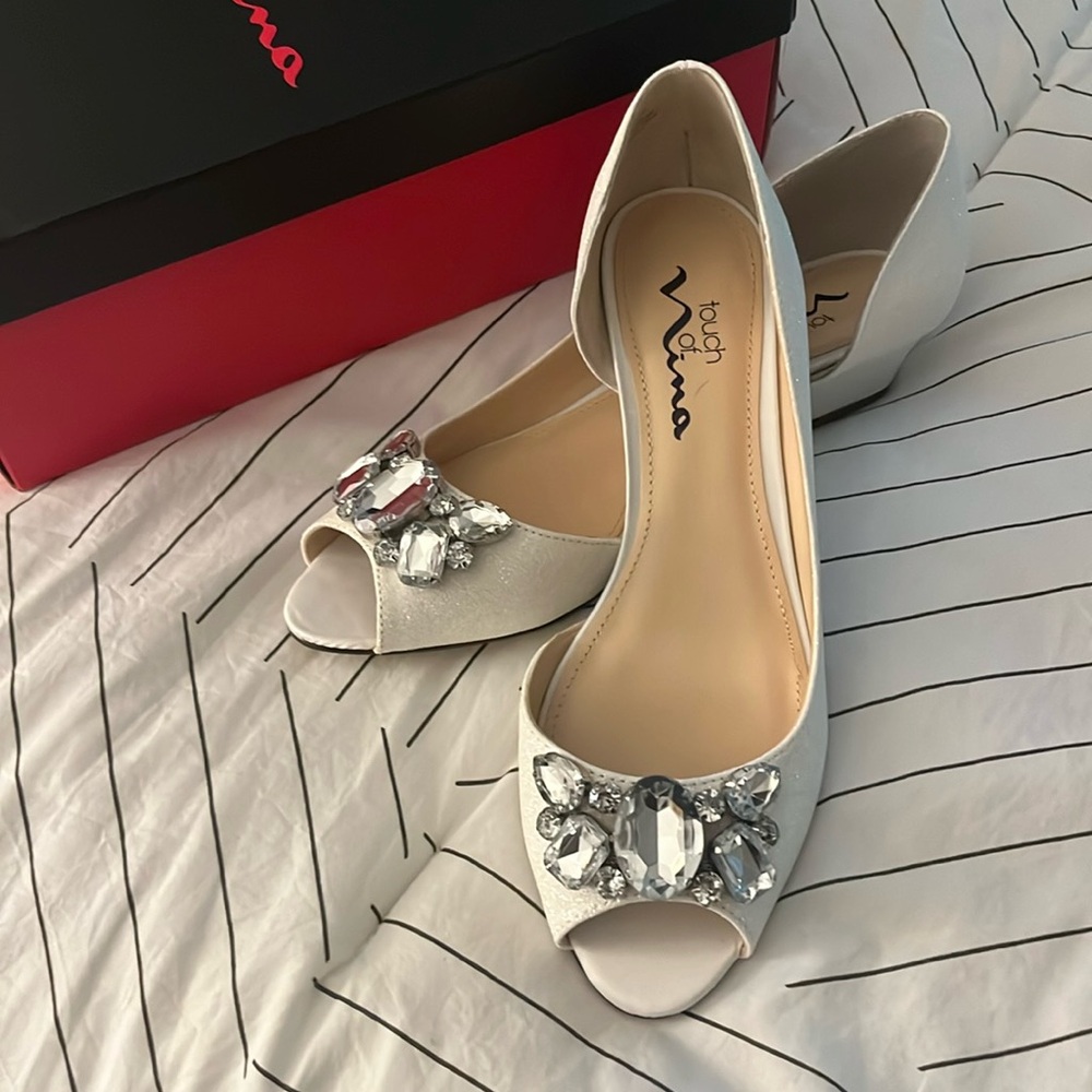 Touch of Nina Bejeweled formal pumps.
